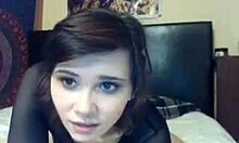 Brunette teen in body stockings teases big natural tits while masturbating slowly