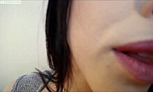 dark-haired busty girlfriend doing striptease?