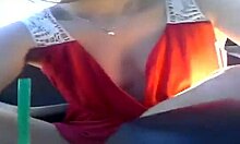 Short-Haired Brunette Posing In Car With Toys