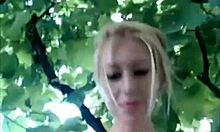 Blond-haired amateur in denim shorts outdoors