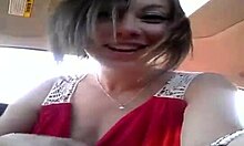 Short-Haired Brunette Posing In Car With Toys