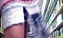 in the public park, a blonde babe with perfect body masturbates in flesh-colored stockings, showing her pussy and ass from behind.