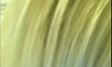 blonde woman uses toys for self-pleasure in public restroom