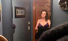Big-Breasted Young Blonde Stares in Mirror Half-Naked with Wet Skin