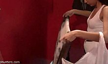 dark-haired teen shows perky ass in locker room