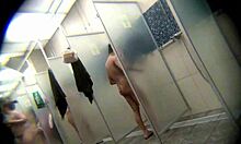 How does this slender brunette look in the shower?