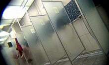 How does this slender brunette look in the shower?