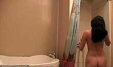 Long-Haired Brunette with Perky Tits Posing in the Shower