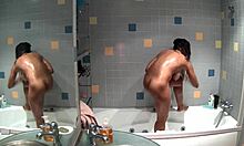 Slim brunette bathes naked in bathroom