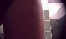 lucky voyeur spies on athletic brunette's naked body in the public shower