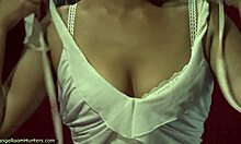 naked blonde puts on white lingerie in hidden cam