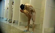 hot babe bends over washing her perfect body on hidden cam