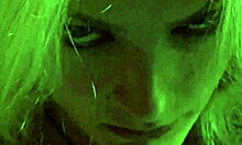 look at the blonde beauty putting on lipstick in see-through lingerie