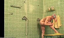 i caught this busty babe shaving her long legs in shower