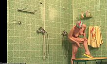 i caught this busty babe shaving her long legs in shower