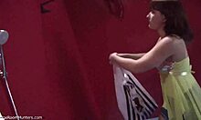 is she stripping in the changing room?