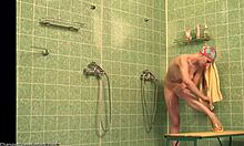i caught this busty babe shaving her long legs in shower