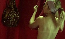 Lovely blonde putting on make-up in changing room hidden cam