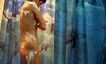 Caught this mature brunette with short hair getting wet in the shower