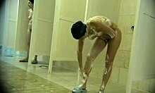 hot babe bends over washing her perfect body on hidden cam