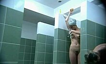 Skinny teen girl washes in shower after public pool swim, captured on hidden camera