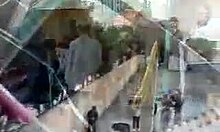 Naked redhead anchorwoman flaunts her tits in front of the camera