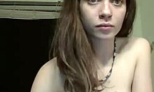 Brown-haired girlfriend with sexy necklace shows off tits