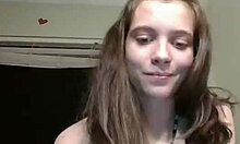 Brown-haired girlfriend with sexy necklace shows off tits