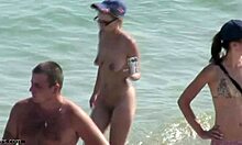 Slender Young Chick Flashes Juicy Pussy on Beach