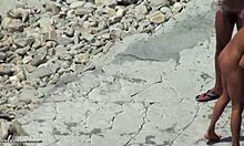 Tanned blonde girlfriend shows hot body on beach