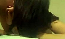 short-haired brunette girlfriend enjoys bedroom intimacy with tattooed partner