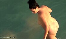 Hey, check my dark-haired chubby girlfriend skinny dipping at nudist beach! 🏖️