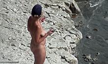 tanned mature chick smoking solo, looking hot