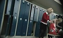 blonde business woman is being watched while undressing