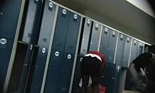 blonde business woman is being watched while undressing