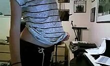 playful teen in tiny top dancing and showing midriff