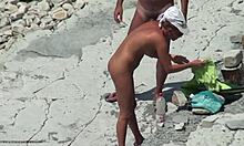 Tanned blonde girlfriend shows hot body on beach