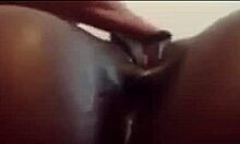 close-up view of an ebony babe masturbating her juicy ass and clit