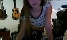 playful teen in tiny top dancing and showing midriff