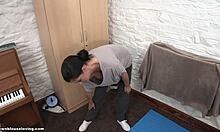 Cute Brunette Babe Shows Off Flexibility in Grey Top