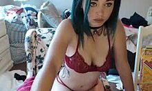Collar-wearing camgirl in red lingerie talks dirty to her fans on webcam!