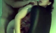 Dark-haired milf in glasses receives doggystyle fucking on office chair after oral