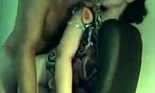 Dark-haired milf in glasses receives doggystyle fucking on office chair after oral