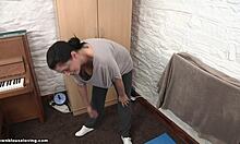 Cute Brunette Babe Shows Off Flexibility in Grey Top