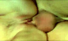 Stockings-clad brunette wife with big tits gives blowjob then rides her partner's big cock cowgirl style sideways in amateur reality