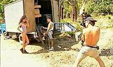 Two stockings-clad chic-looking girlfriends double teaming a massive cock