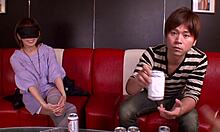 asian angel teasingly sucks his hard cock in the bedroom