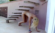 hey, check out this slim blonde posing naked and showing her hairy pussy on the steps 😍