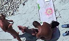 blond babe flaunting her naked body at the beach on hidden cam