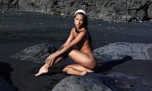 dude, check this tanned babe rolling naked in mud during photoshoot